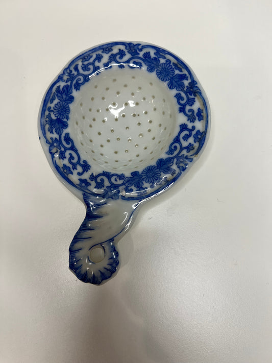 Vintage porcelain tea strainer